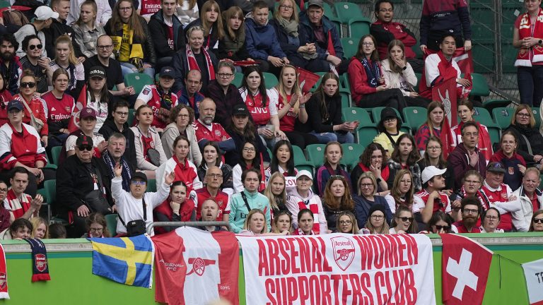 Arsenal fans cheer their team during the women's Champions League soccer semifinal first leg soccer match between VfL Wolfsburg and Arsenal WFC in Wolfsburg, Germany, Sunday, April 23, 2023. (Martin Meissner/AP)