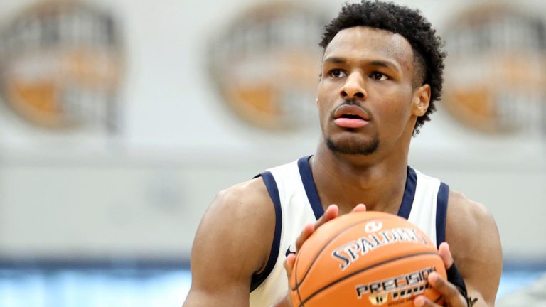 Bronny James warms up at halftime during a high school basketball game at the Hoophall Classic, Monday, Jan. 16, 2023, in Springfield, Mass. (AP) 