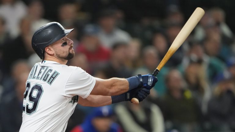 Seattle Mariners' Cal Raleigh follows through during an at-bat in a baseball game against the Texas Rangers, Thursday, Sept. 28, 2023, in Seattle. (Lindsey Wasson/AP)