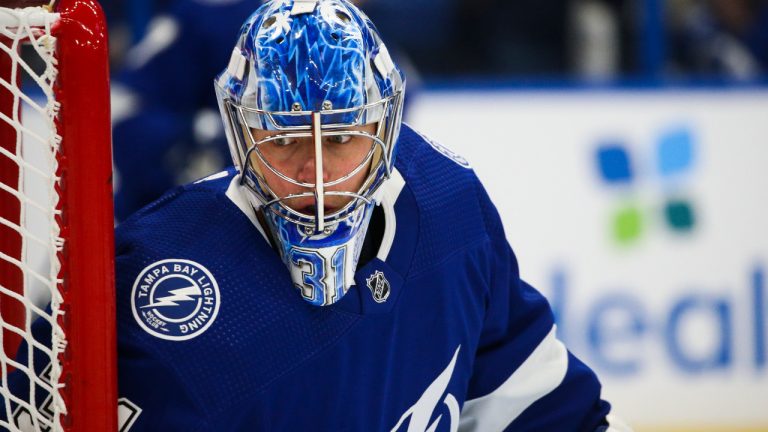 Tampa Bay Lightning goaltender Jonas Johansson warm ups before taking on the Carolina Hurricanes in a preseason NHL hockey game Friday, Sept. 29, 2023, in Tampa, Fla. (Dirk Shadd/AP) 