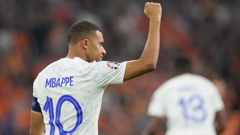 France's Kylian Mbappe celebrates after scoring his side's opening goal during the Euro 2024 group B qualifying soccer match between The Netherlands and France at the Johan Cruyff ArenA stadium in Amsterdam, Netherlands, Friday, Oct. 13, 2023. (AP)