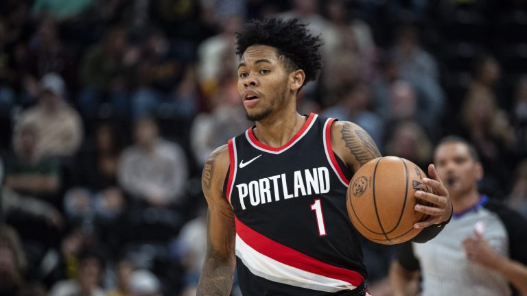 Portland Trail Blazers guard Anfernee Simons (1) takes the ball up the court against the Utah Jazz during the first half of an NBA preseason basketball game Saturday, Oct. 14, 2023, in Salt Lake City. (Isaac Hale/AP)