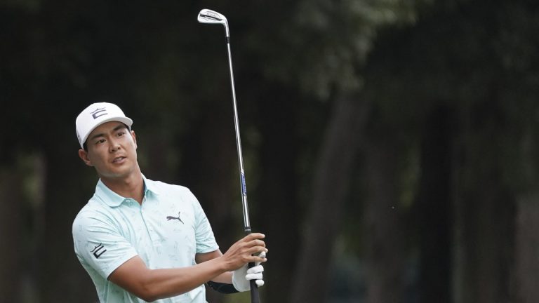 Justin Suh of the United State hits a shot on the seventeenth hole in the third round of the PGA Tour Zozo Championship at the Narashino Country Club in Inzai on the outskirts of Tokyo, Saturday, Oct. 21, 2023. (Tomohiro Ohsumi/AP)