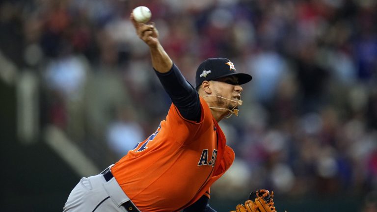Houston Astros relief pitcher Bryan Abreu throws a pitch that hit Texas Rangers' Adolis Garcia during the eighth inning in Game 5 of the baseball American League Championship Series Friday, Oct. 20, 2023, in Arlington, Texas. Abreu received a two-game suspension and an undisclosed fine for intentionally throwing at García. (Julio Cortez/AP)