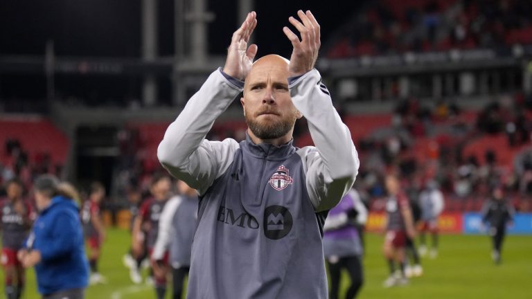 Toronto FC midfielder Michael Bradley (4) applauds to the crowd at the end of second half MLS soccer action in Toronto on Saturday, Oct. 21, 2023. This was Bradley's final game of his MLS career. (Nathan Denette/CP)