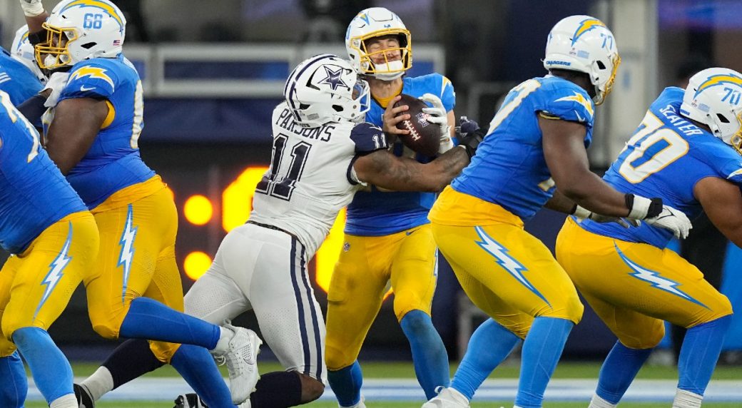 Cowboys pick off Herbert late to clinch win over Chargers Esports PH