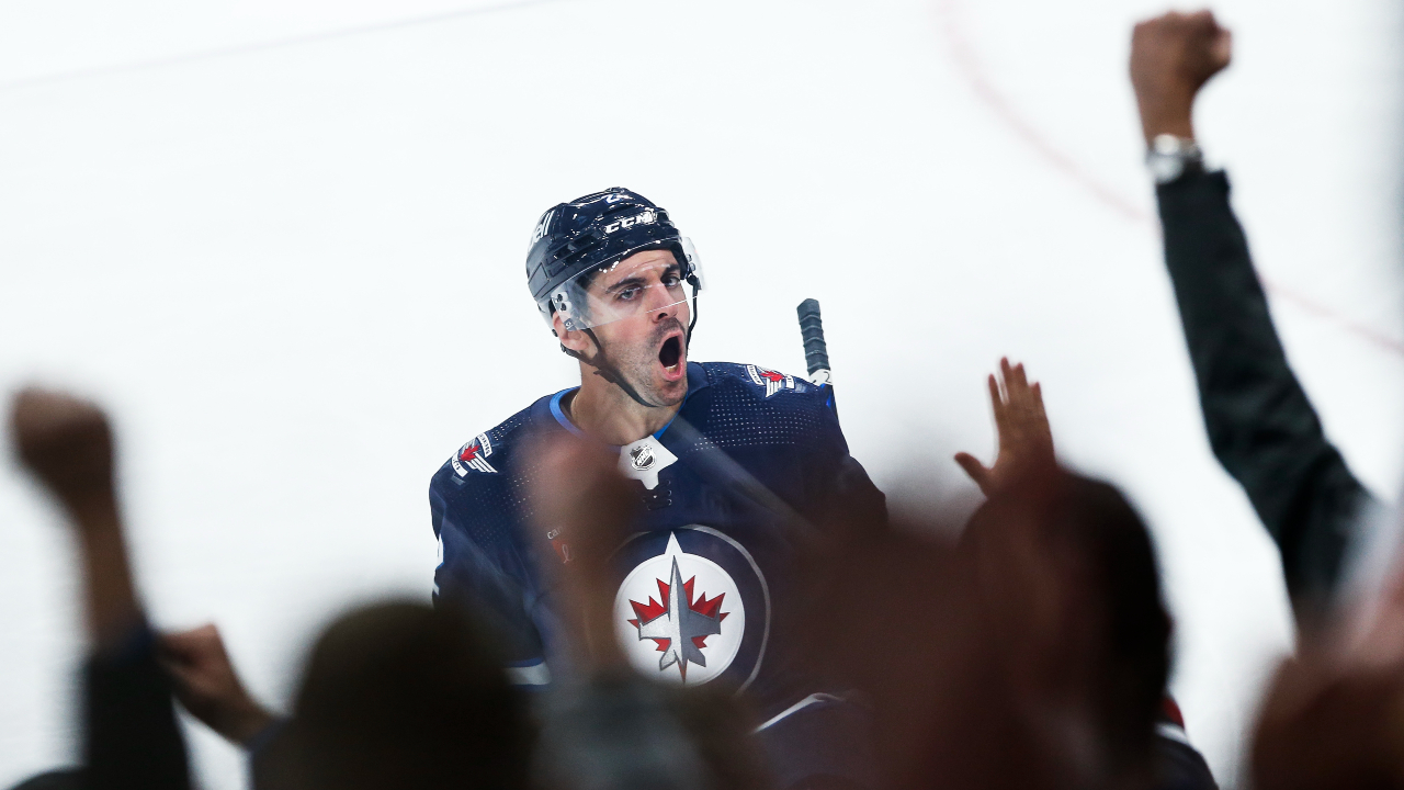 Connor scores twice, adds assist as Jets win home opener 6-4 over