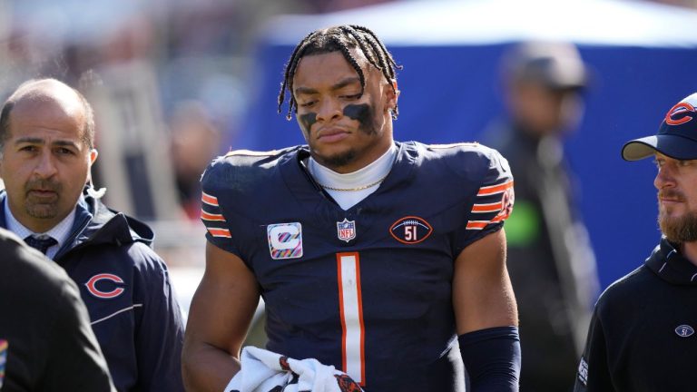 Chicago Bears quarterback Justin Fields walks to the locker room after being sacked during the second half of an NFL football game against the Minnesota Vikings, Sunday, Oct. 15, 2023, in Chicago. (Charles Rex Arbogast/AP Photo)