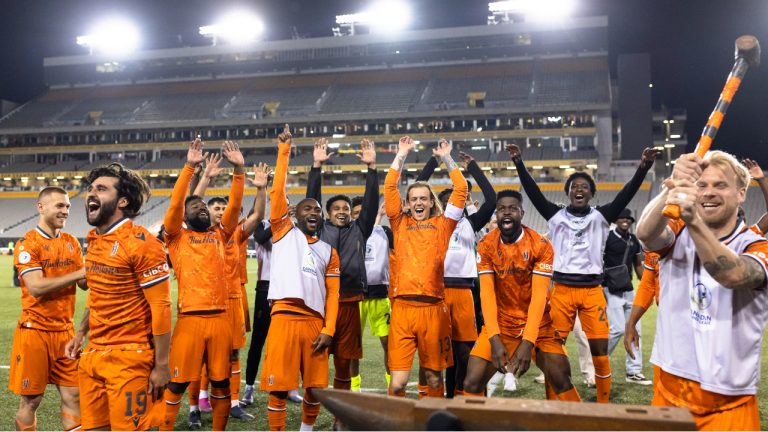 Forge FC teammates celebrate after defeating Atletico Ottawa on penalties during the Canadian Championship quarterfinal at Tim Hortons Field in Hamilton, Tuesday, May 9, 2023. (Nick Iwanyshyn/CP)