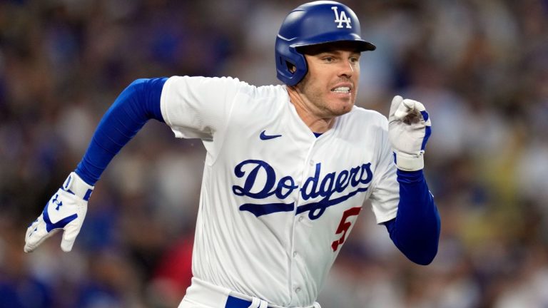 Los Angeles Dodgers' Freddie Freeman runs for a infield single during the first inning in Game 2 of a baseball NL Division Series against the Arizona Diamondbacks, Monday, Oct. 9, 2023, in Los Angeles. (Ashley Landis/AP)