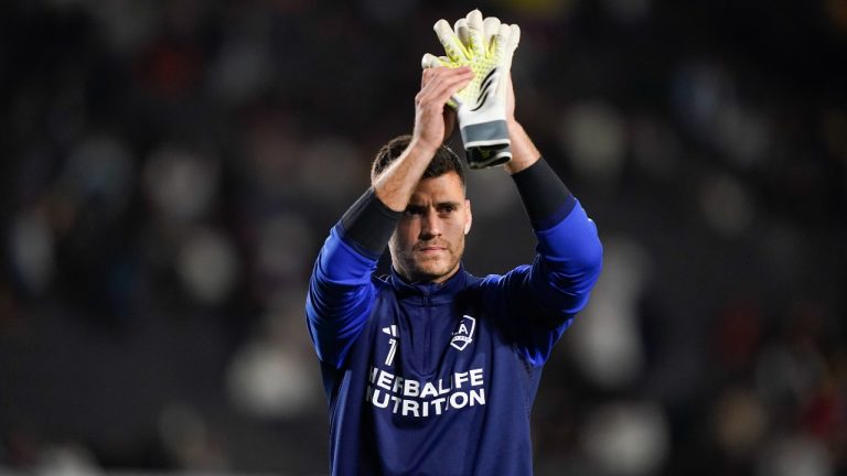 LA Galaxy goalkeeper Jonathan Bond waves to the crowd after the team's MLS soccer match against Real Salt Lake, which ended in a 2-2 draw. (Ryan Sun/AP)