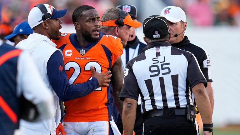 Denver Broncos safety Kareem Jackson reacts to being disqualified from the game after a hit on Green Bay Packers tight end Luke Musgrave during the second half of an NFL football game in Denver, Sunday, Oct. 22, 2023. (Jack Dempsey/AP Photo)