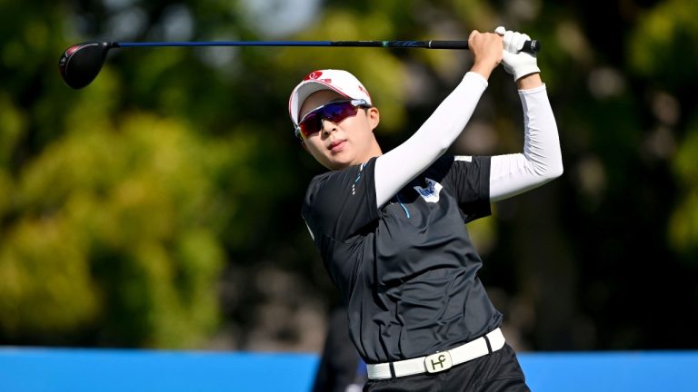 Hyo Joo Kim hits a tee shot. (Michael Woods/AP)