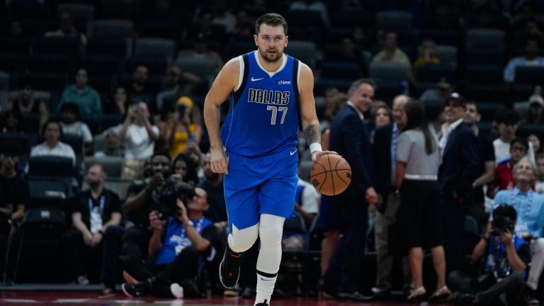 Luka Doncic of Dallas Mavericks dribbles during a preseason NBA game between Dallas Mavericks and Milwaukee Bucks Abu Dhabi, United Arab Emirates, Thursday, Oct. 6, 2023. (Kamran Jebreili/AP Photo)