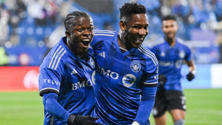 CF Montreal's Kwadwo Opoku celebrates with teammate Romell Quioto after scoring against the Portland Timbers during first half MLS soccer action in Montreal, Saturday, October 7, 2023. (Graham Hughes/CP Photo)