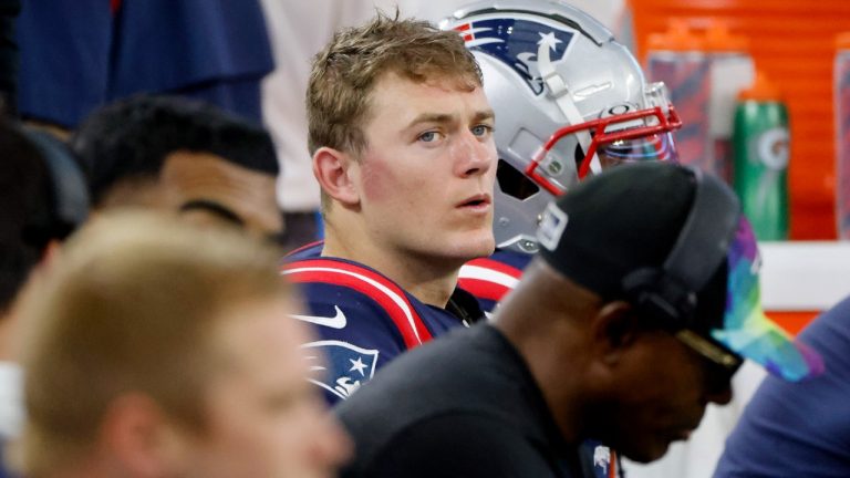 New England Patriots quarterback Mac Jones sits on the bench late in the second half of an NFL football game against the Dallas Cowboys in Arlington, Texas, Sunday, Oct. 1, 2023. (Michael Ainsworth/AP)