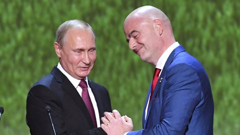 FILE - FIFA President Gianni Infantino, right, and Russian President Vladimir Putin greet each other as they attend a concert at the Bolshoi Theater in Moscow, Russia, on Saturday, July 14, 2018, at the close of the World Cup tournament. (Yuri Kadobnov/Pool Photo via AP, File)