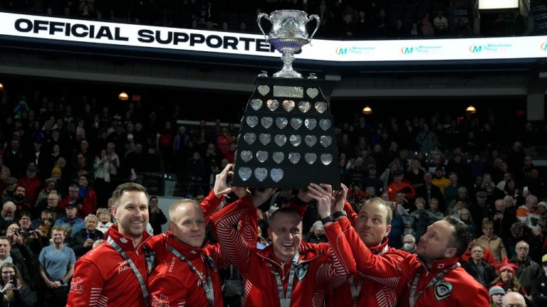 Team Canada skip Brad Gushue, left to right, celebrates with teammates Mark Nichols, EJ Harnden, Geoff Walker and Caleb Flaxey after defeating Team Manitoba in the finals of the 2023 Tim Hortons Brier in London, Ont., Sunday, March 12, 2023. It's Gushue's fifth Tim Hortons Brier crown in the last seven years. (Frank Gunn/CP)