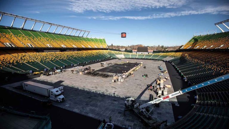 Crews work to prepare Commonwealth Stadium for the upcoming Heritage Classic in Edmonton. (Jason Franson/THE CANADIAN PRESS)
