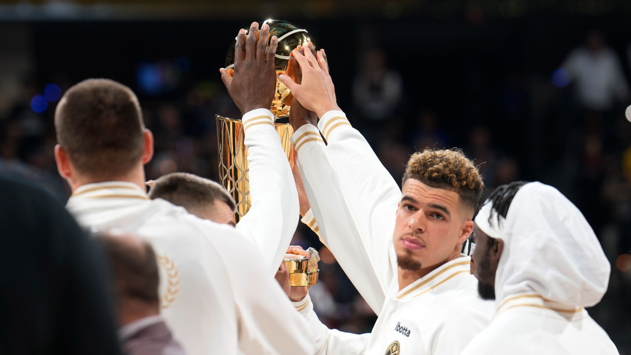 Jokic and the Nuggets receive rings, watch championship banner raised  before tipping off season - The San Diego Union-Tribune
