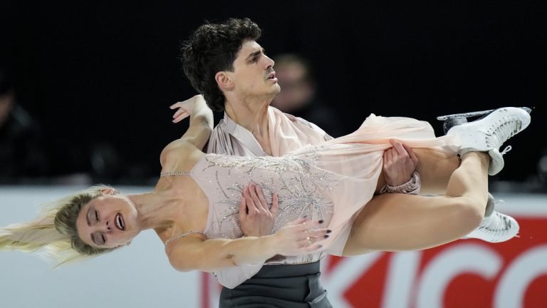 Piper Gilles and Paul Poirier, of Canada, perform their ice dance free program during the Skate Canada International figure skating competition, in Vancouver, on Saturday, October 28, 2023. (Darryl Dyck/THE CANADIAN PRESS)