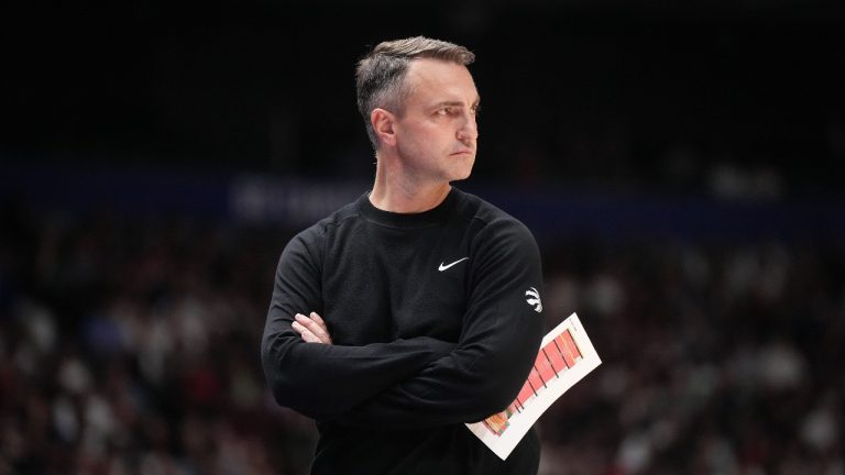Toronto Raptors head coach Darko Rajakovic watches from the sideline during the first half of an NBA basketball game. (Darryl Dyck/CP)
