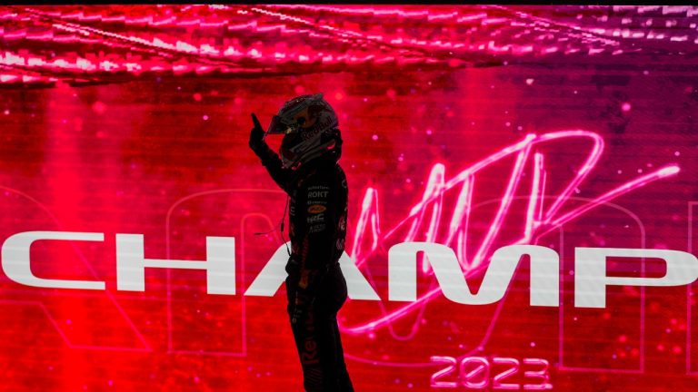 Red Bull driver Max Verstappen of the Netherlands celebrates as he became F1 drivers world champion after the sprint race ahead of the Qatar Formula One Grand Prix at the Lusail International Circuit, in Lusail, Qatar, Saturday, Oct. 7, 2023. (Darko Bandic/AP)