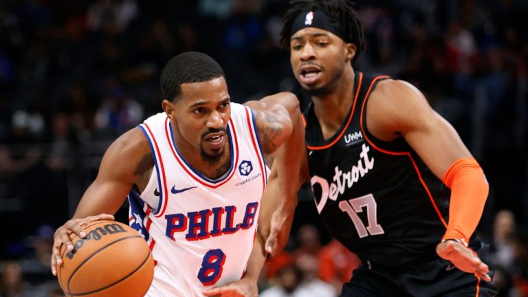 Philadelphia 76ers guard De'Anthony Melton drives against Detroit Pistons guard Stanley Umude during the first half of an NBA basketball in-season tournament game Friday, Nov. 10, 2023, in Detroit. (Duane Burleson/AP Photo)
