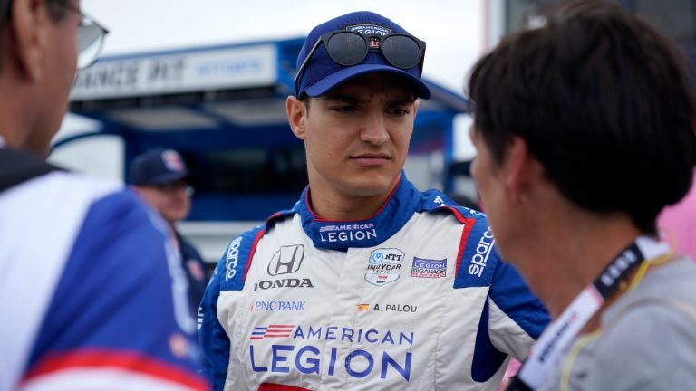 Alex Palou prepares before the start of an IndyCar auto race at World Wide Technology Raceway, Sunday, Aug. 27, 2023, in Madison, Ill. (Jeff Roberson/AP Photo)