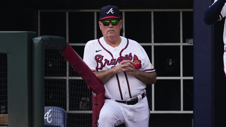 Atlanta Braves manager Brian Snitker watches from the ddugout during a baseball game against the Washington Nationals, Sunday, Oct. 1, 2023, in Atlanta. (John Bazemore/AP)