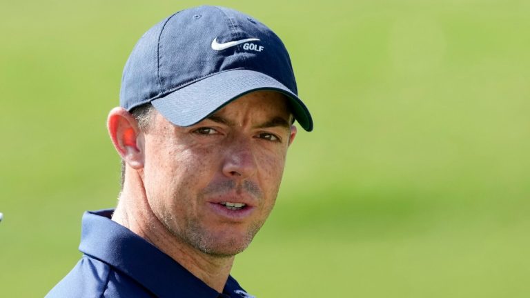 Rory McIlroy of Northern Ireland plays his second shot on the 3rd hole during the round two of the DP World Tour Championship golf tournament, in Dubai, United Arab Emirates, Friday, Nov. 17, 2023. (AP Photo/Kamran Jebreili)