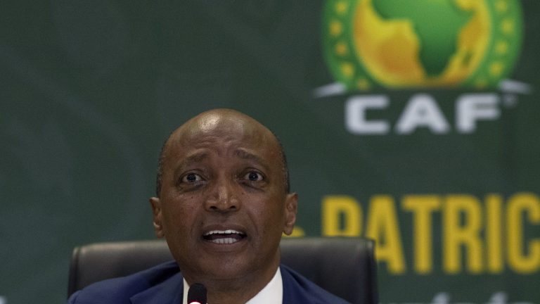 FILE - Confederation of African Football (CAF) President Patrice Motsepe speaks during a news conference in Johannesburg, South Africa, Tuesday, March 16, 2021. The African soccer confederation announced late Friday, Sept. 30, 2022 that it has removed Guinea as host of the 2025 African Cup of Nations because of inadequate infrastructure, the latest in a series of switches and delays for the continental championship over the last 10 years. It was announced after Motsepe traveled to the country to meet with the head of the military junta in Guinea who took power in a coup in 2021. (AP Photo/Themba Hadebe, File)