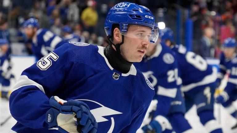 Tampa Bay Lightning left winger Cole Koepke wears a protective neck guard before an NHL hockey game against the Edmonton Oilers Saturday, Nov. 18, 2023, in Tampa, Fla. (Chris O'Meara/AP Photo)