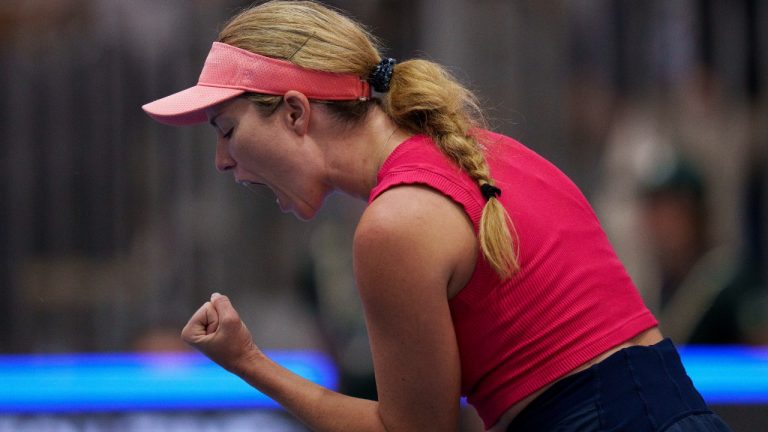 Danielle Collins celebrates a point against Czech Republic's Katerina Siniakova during their group stage tennis match at the Billie Jean King Cup finals at La Cartuja stadium in Seville, southern Spain, Spain, Friday, Nov. 10, 2023. (Manu Fernandez/AP)