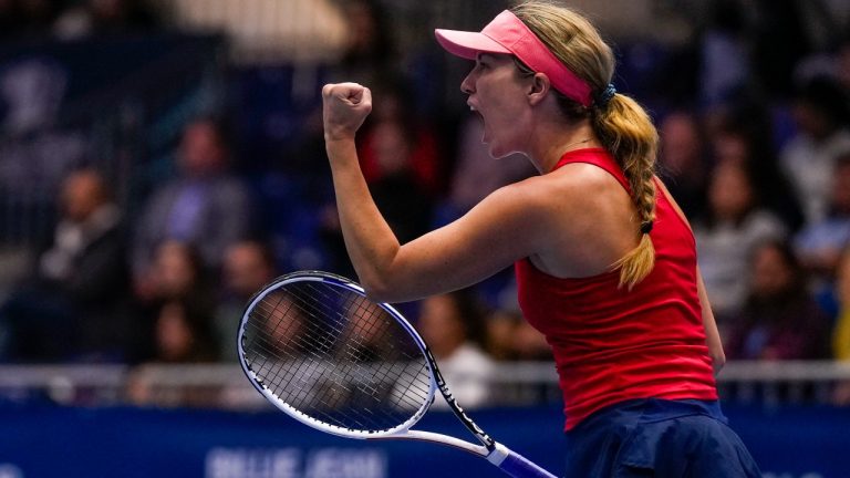 US Danielle Collins celebrates after defeating Switzerland's Celine Naef during their group stage tennis match at the Billie Jean King Cup finals at La Cartuja stadium in Seville, southern Spain, Spain, Thursday, Nov. 9, 2023. (Manu Fernandez/AP)