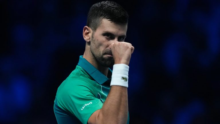 Serbia's Novak Djokovic reacts during the singles tennis match against Denmark's Holger Rune, of the ATP World Tour Finals at the Pala Alpitour, in Turin, Italy, Sunday, Nov. 12, 2023. (Antonio Calanni/AP)