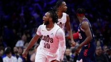 Garland leads shorthanded Cavaliers to tournament win over 76ers in OT
