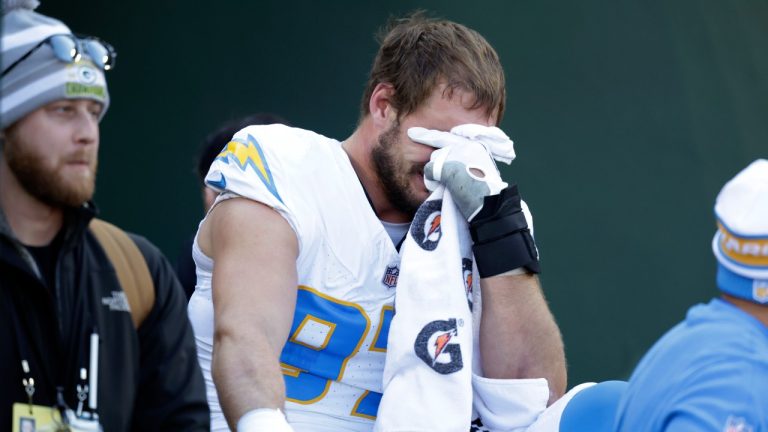 Los Angeles Chargers linebacker Joey Bosa is carted off the field during the first half of an NFL football game against the Green Bay Packers, Sunday, Nov. 19, 2023, in Green Bay, Wis. (Matt Ludtke/AP)