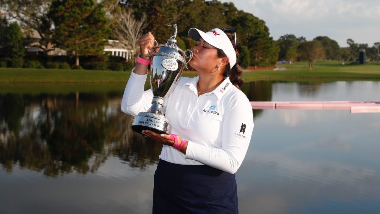 Lilia Vu, kisses the first place trophy after winning an LPGA golf tournament, Sunday, Nov. 12, 2023, in Belleair, Fla. (Scott Audette/AP)