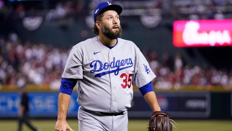 Los Angeles Dodgers starting pitcher Lance Lynn walks off the field after being taking out during the third inning of Game 3 of a baseball NL Division Series against the Arizona Diamondbacks Wednesday, Oct. 11, 2023, in Phoenix. (Ross D. Franklin/AP Photo)