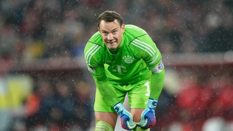 Bayern's goalkeeper Manuel Neuer adjusts his socks during the German Bundesliga soccer match between 1.FC Cologne and Bayern Munich in Cologne, Germany, Friday, Nov. 24, 2023. (Martin Meissner/AP Photo)