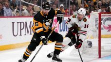 Penguins’ Karlsson, Capitals’ Wilson wear neck guards in practice