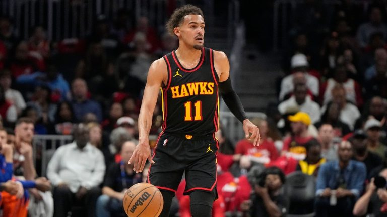 Atlanta Hawks guard Trae Young moves the ball against the New York Knicks during the first half of an NBA basketball game, Friday, Oct. 27, 2023, in Atlanta. (Mike Stewart/AP Photo)