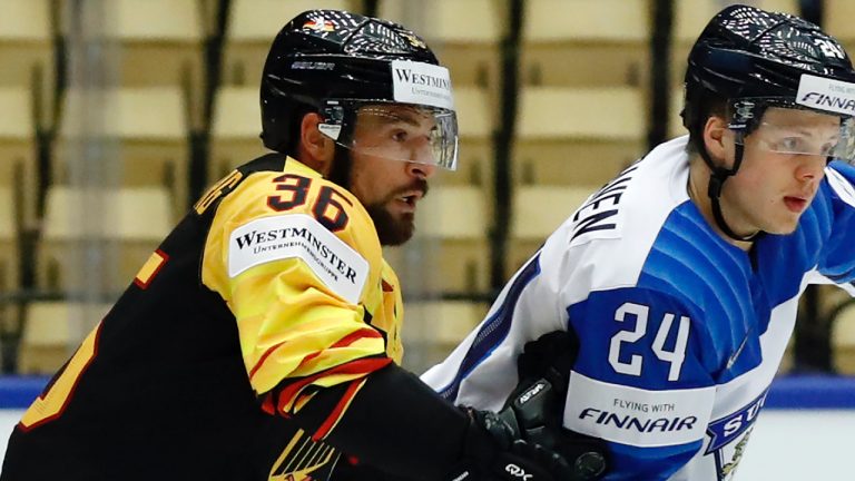 Germany's Yannic Seidenberg, left, challenges for the puck with Finland's Kasperi Kapanen, right, during their Ice Hockey World Championships group B match at the Jyske Bank Boxen arena in Herning, Denmark, Sunday, May 13, 2018. Yannic Seidenberg, who played on the German national hockey team that won silver at the 2018 Winter Olympics, has been banned for four years in a doping case, it was announced Tuesday, Nov. 21, 2023. (Petr David Josek/AP)