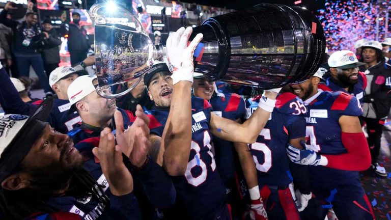 Montreal Alouettes wide receiver Austin Mack (81) hoists the Grey Cup as the Alouettes celebrate defeating the Winnipeg Blue Bombers to win the 110th CFL Grey Cup in Hamilton. (Nathan Denette/THE CANADIAN PRESS)