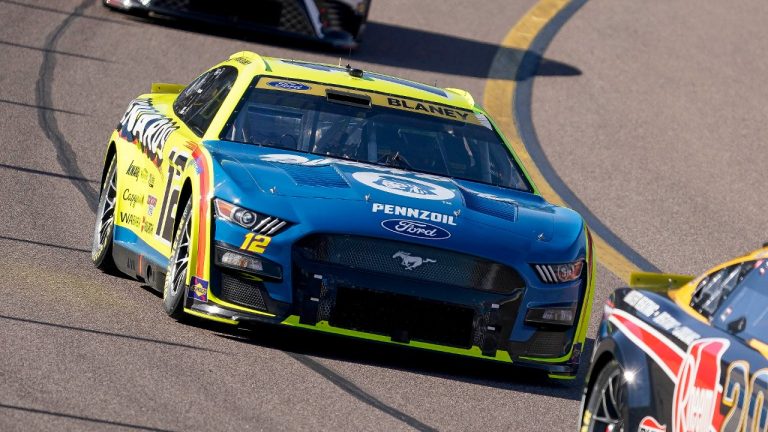 Ryan Blaney (12) takes Turn 4 to start a NASCAR Cup Series Championship auto race at Phoenix Raceway, Sunday, Nov. 5, 2023, in Avondale, Ariz. (Darryl Webb/AP)