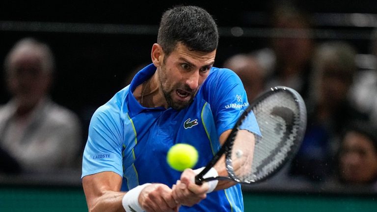 Serbia's Novak Djokovic returns the ball to Russia's Andrej Rublev during the semifinal of the Paris Masters tennis tournament at the Accor Arena, Saturday, Nov. 4, 2023, in Paris. (Michel Euler/AP)
