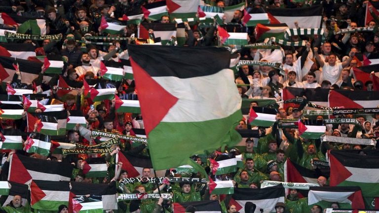 After Celtic fans displayed Palestinian flags at a Champions League game, the club was fined 17,500 Euros. (Andrew Milligan/AP)