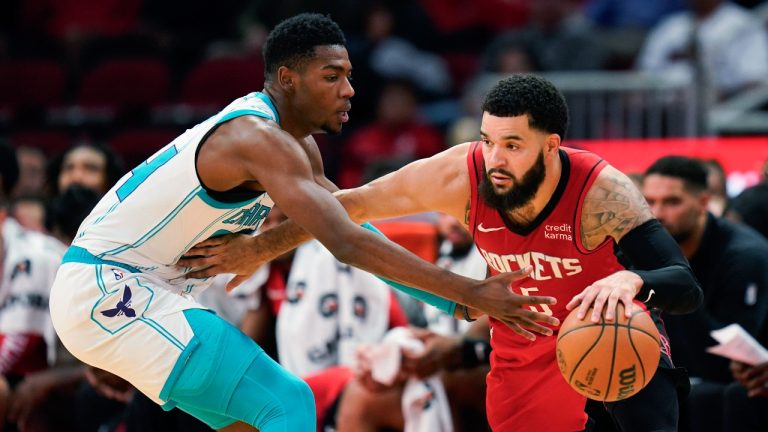 Houston Rockets guard Fred VanVleet, right, dribbles the ball as Charlotte Hornets forward Brandon Miller defends during the second half of an NBA basketball game Wednesday, Nov. 1, 2023, in Houston. (Eric Christian Smith/AP Photo)