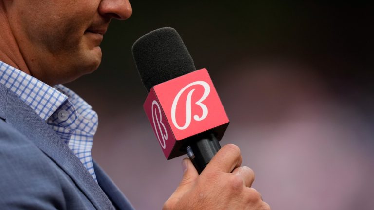 A Bally Sports television reporter broadcasts before a baseball game between the Philadelphia Phillies and the Detroit Tigers, Monday, June 5, 2023, in Philadelphia. (Matt Slocum/AP)